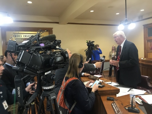 Williamson County Judge Dan Gattis responds to reporters following the 5-0 vote by Commissioner to approve the Chapter 381 agreement with Apple Inc. 