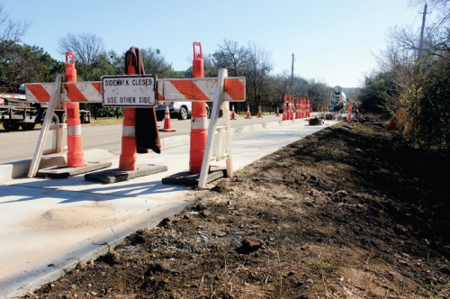 City construction of new sidewalks and a shared-use path on Adelphi Lane in Northwest Austin is from December 2018. 
