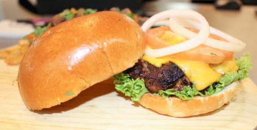 The classic beef burger ($8) at Fanoosh is served with American cheese, veggies and Fanoosh sauceu2014a mix of ketchup, mayo and Worcestershire sauce with a blend of spices. 