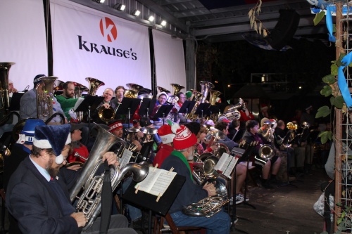 Tuba and euphonium players perform holiday music for a crowd a Krause's Cafe in downtown New Braunfels on Dec. 13.