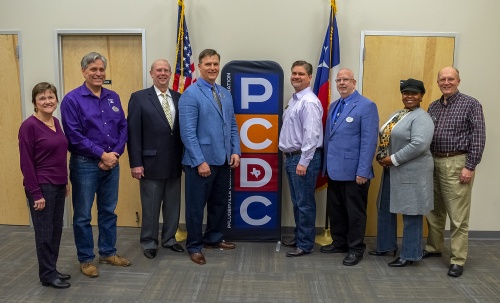 From left: PCDC Executive Director Amy Madison, Jeff Coleman, Victor Johnson, Ken D'Alfonso, Doug Weiss, Ron Agnew, A.K. Brewer and George Vande Werken.