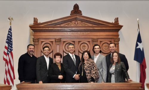 County Judge Ruben Becerra (fourth from left) was joined by family and staff members for the Jan. 2 swearing-in ceremony.