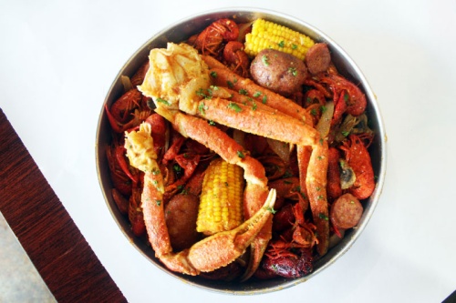  Customers can order crawfish and other seafood by the pound. Orders with 2 pounds or more come with potatoes, corn and mushrooms.