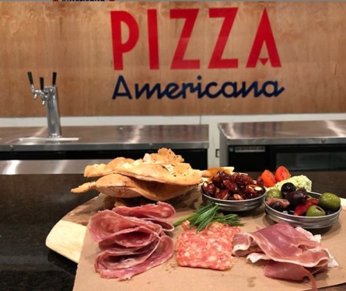 The restaurant serves a charcuterie board along with salads, pasta, pizza and soft-serve gelato.