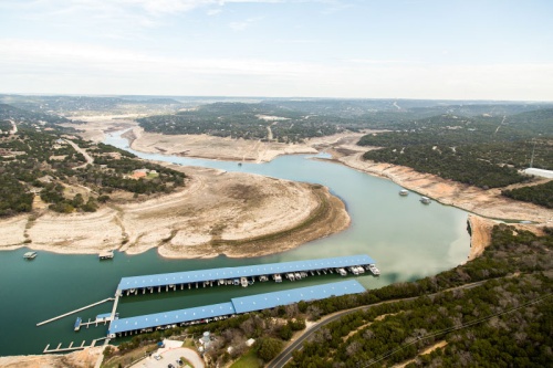 During the drought of 2014 (pictured), Lake Travis hit a low of 621.92 feet msl. When full, the lake sits at 681.72 feet msl. The lakeu2019s lowest recorded level of 614.18 feet msl was reached in 1951, according to numbers from the Lower Colorado River Authority.