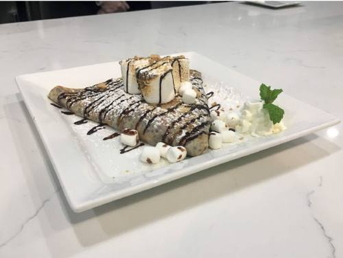 Su2019mores crepe ($8.95)nThis dish features a freshly cooked crepe stuffed with Nutella hazelnut spread and topped with torched marshmallows, graham cracker crumbs and chocolate sauce.