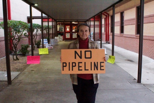 Wimberley resident Alice Anderson demonstrated her opposition to the pipeline Feb. 13.
