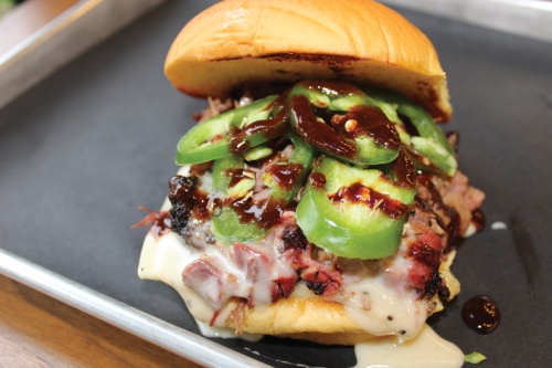 The Colorado ($11.89) features smoked brisket, jalapenos, pepper jack cheese and spicy red sauce on a toasted bun.