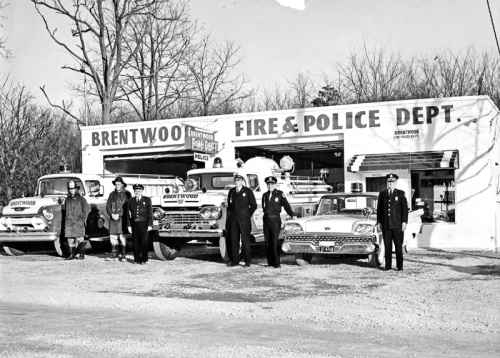 Police and fire department officials stand outside the former Brentwood fire and police building in the 1960u2019s. 