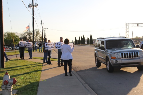 Protesters gathered March 25 to call for GCISD board President Lisa Pardo's resignation.