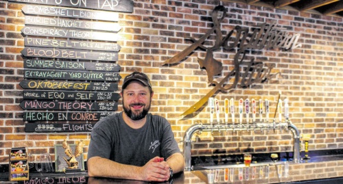 Dave Fougeron, co-founder of Southern Star Brewing Co., stands in the breweryu2019s taproom.