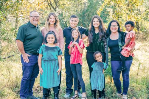 Lisa Johnson (second from right) poses with her family.