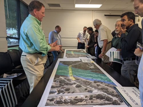 Travis County officials and engineers present alternative plans for the Spicewood Springs Road bridge replacement at an April 29 public meeting at the Spicewood Springs Branch Public Library located in Northwest Austin.