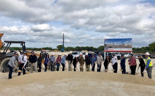Lake Travis ISD board members and administration, elected officials and other community members break ground April 16 on the new Elementary School No. 7. 