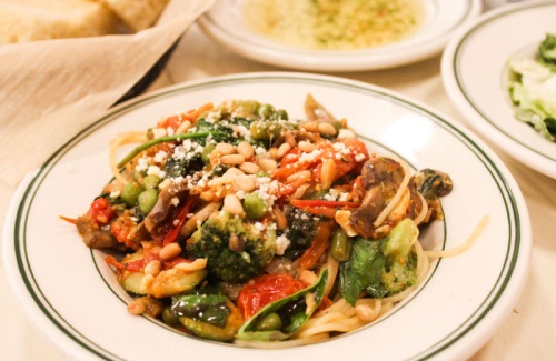 Spaghetti Ortolano is topped with a sauce of zucchini, tomatoes, spinach, broccoli and more.