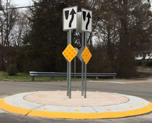 Traffic calming projects include adding signs to improve traffic flow.