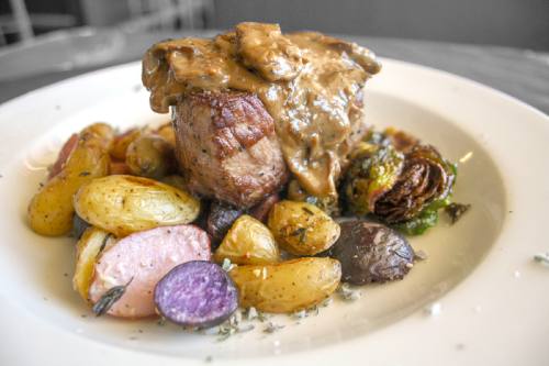 Filet mignon ($25)nA seared 6-ounce filet is topped with nsauteed mushroom demi.