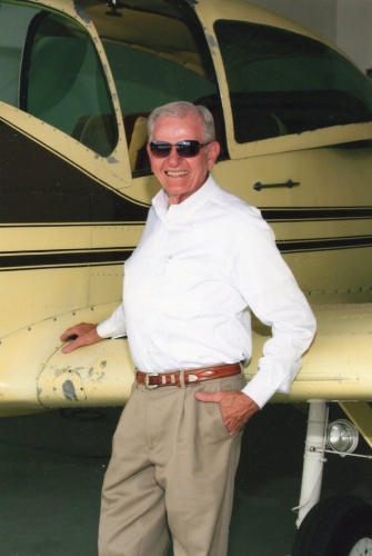 Lakeway resident Charles Edwards poses with an airplane. 