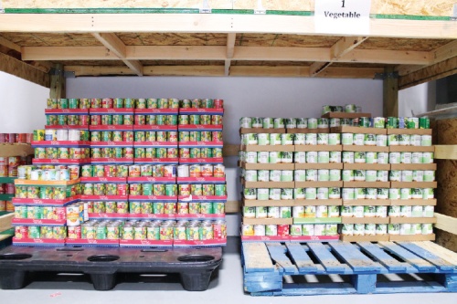 Frisco FastPacsu2019 warehouse is stocked with canned goods and other donations.