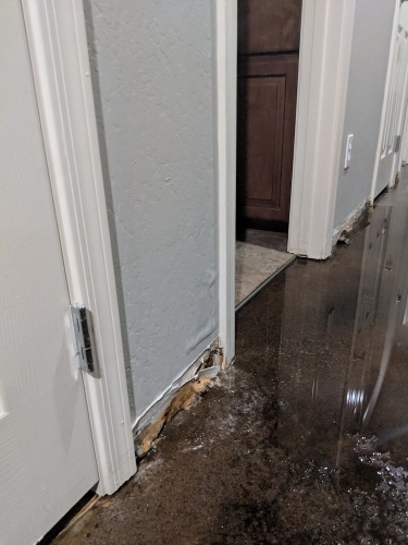 Homeowners insurance does not cover flood damage in homes, like this damage from a rainstorm.