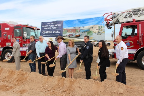 Town officials turn dirt at the May 20 Public Safety Training Facility groundbreaking. From left are Town Manager Patrick Banger, Council Member Jordan Ray, Council Member Scott Anderson, Council Member Brigette Peterson, Vice Mayor Eddie Cook, Mayor Jenn Daniels, police Chief Michael Soelberg, Deputy Town Manager Leah Hubbard and fire Chief Jim Jobusch.