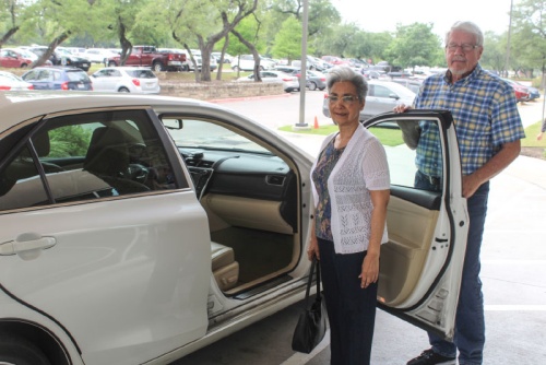 Volunteer David Gibbs picks up client Marcia Gomez from her physical therapy appointment at Cedar Park Regional Medical Center in April.