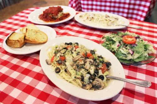 All pasta dishes, like the restaurantu2019s lasagna ($9.99), Puttanesca ($11.99) and Fettuccine Alfredo with chicken ($13.99), are served with garlic bread and a house salad. 