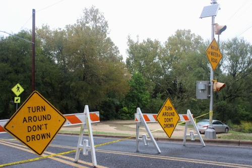 Multiple low-water crossings on Spicewood Springs Road have been closed.