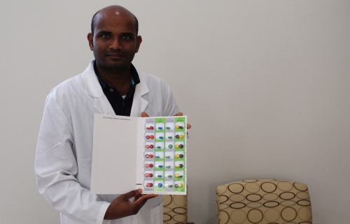 Co-owner and pharmacist Murali Naara showcases Alexa Pharmacy's blister packaging.