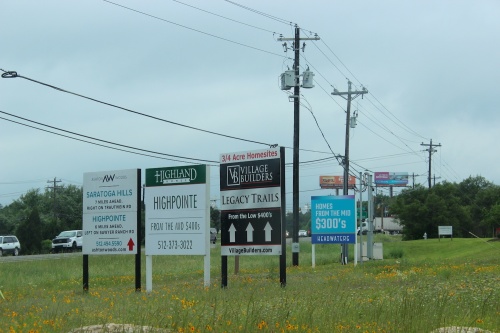 Along Hwy. 290 in South Austin, signs of new and developing housing communities are plentiful.