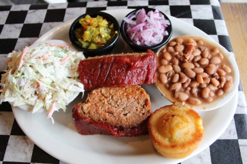 A large portion of meatloaf ($10.49) is served with a choice of two sides, relish and a cornbread muffin.