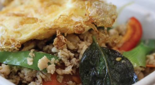 Basil minced chicken ($10) The basil minced chicken is not on the menu but can be requested. It is made with minced chicken, rice, vegetables, basil and garlic chili sauce and has a fried egg on top.