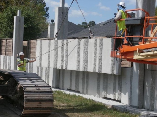 Crews work on a sound wall near the Cypress Mill Estates subdivision in 2017. Construction has not yet begun on the sound wall in Jersey Village.