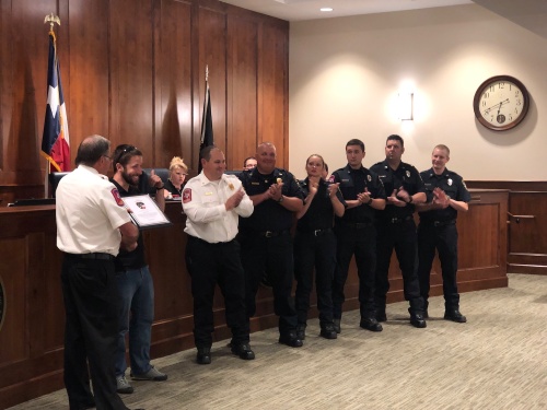 Fire Chief Russell Wilson honors the crew who responded to a call June 9 to save a man.