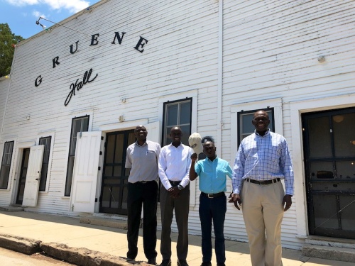 Representatives from the Republic of Uganda Ministries of Water and Environment and Finance visit historic Gruene Hall during a tour of local water features and management systems in New Braunfels.