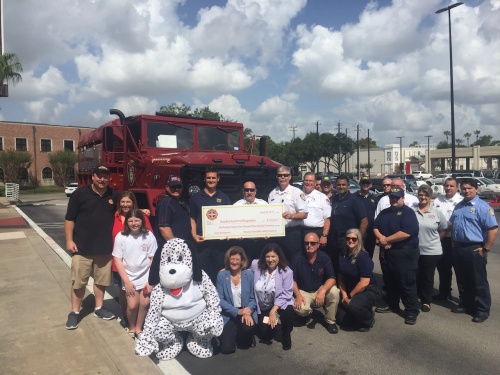 A check for over $105,000 was presented to local firefighters at the Firehouse Subs in Meyerland on Aug. 21, 2019.