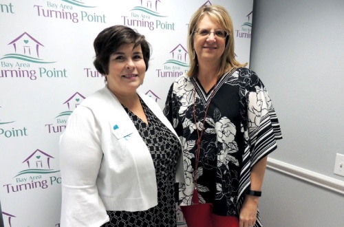 President and CEO Leigh Ann Fry, right, and Donor Relations Director Angela Corns are dedicated to ending domestic and sexual violence.