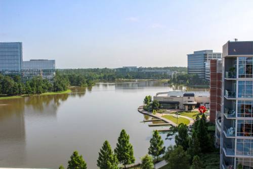 Residents of Two Lakes Edge will have views of Lake Woodlands from outdoor balconies and from a sky lounge at the top of the eight-story building.