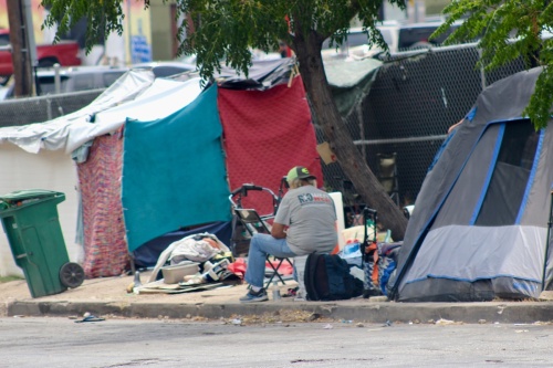 Homelessness camps, such as this one across the street from the Austin Resource Center for the Homeless, are in focus as City Council debated public camping ordinance changes. 