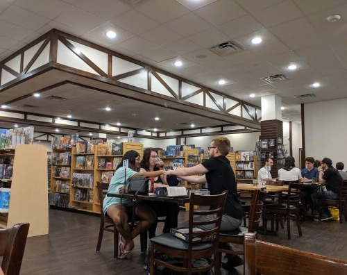 Emerald Tavern Games & Cafe expanded its space to include private booths for tabletop and role-play gaming.