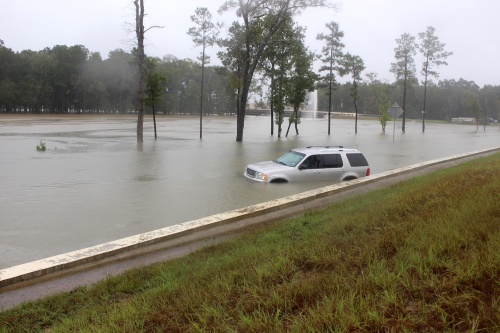 High water covered parts of Grand Parkway feeder lanes near Valley Ranch Parkway on Sept. 19. 