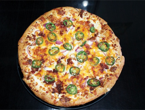 Jalapeno popper pizza ($14.19) The jalapeno popper pizza is made with a cream cheese base and topped with cheddar cheese, garlic, red onions and jalapenos.
