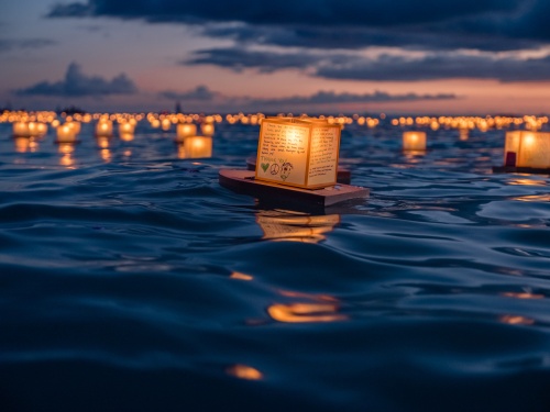 Guests launch lighted lanterns with names of loved ones and special messages onto Lake Serenity Sept. 14.
