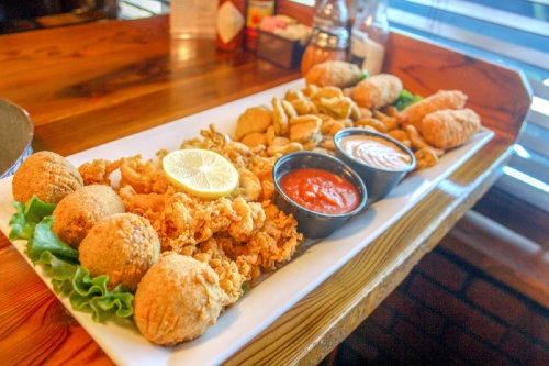 Starter sampler ($10.99 single, $17.99 double):  This sampler includes boudin balls, stuffed jalapenos and a choice of pickles, zucchini, green tomatoes or calamari.