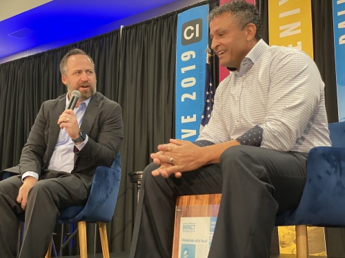 Local entrepreneur JT McCormick (right) speaks with Community Impact Newspaper CEO John Garrett on Oct. 24 during the company's 2019 Thrive conference in Pflugerville, Texas. 