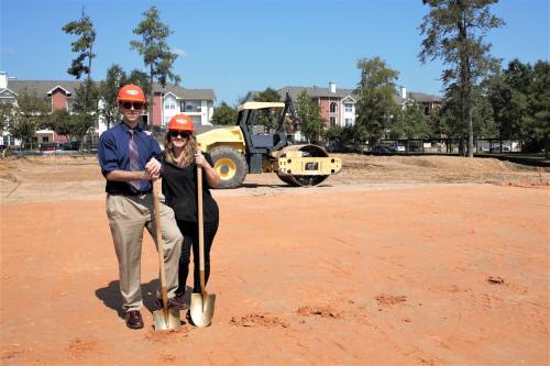 Dr. Logan Wood and his wife, Traci Wood, at the location of Conroe Family Dentistry's upcoming location.