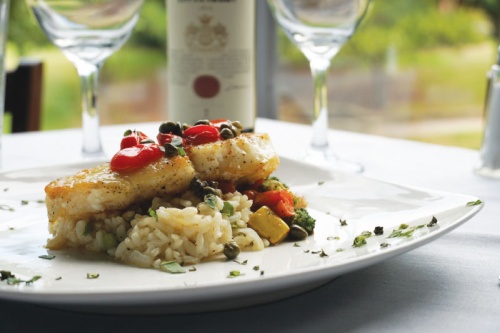 The Chilean sea bass ($34.99) comes on a bed of risotto with fresh vegetables.u00a0