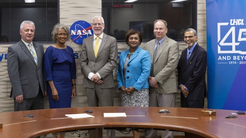 University of Houston-Clear Lake President Ira K. Blake (second from left), Johnson Space Center Director Mark Geyer (third from left) and others attended the signing of the Space Act Agreement and Annex on Oct. 1.