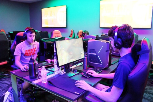 Team members practice in the on-campus Sector 7 Energy Esports Gaming Arena.